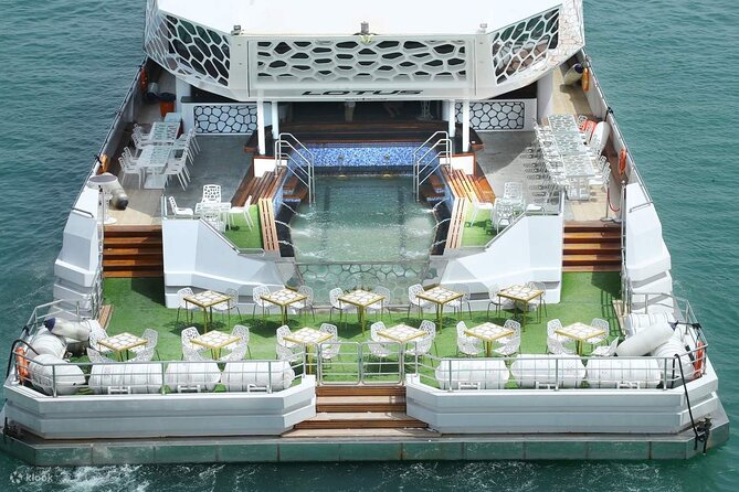 3-Hour Lotus Mega Yacht Dinner Cruise Dubai with Transfers - Onboard entertainment: performances, music, and the photo option