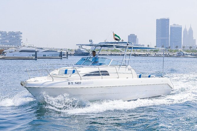 33Ft Private Yacht Rental On New Year's Eve 2025 - Burj Al Arab by sea (1 hour): the 321m icon and the tall-atrium angle