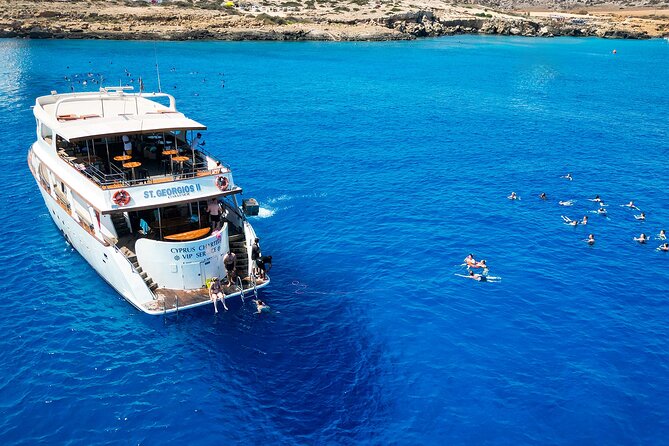 A Protaras Luxury Yacht Private Charter Experience - Fig Tree Bay sail-by: coastline first, crowds second