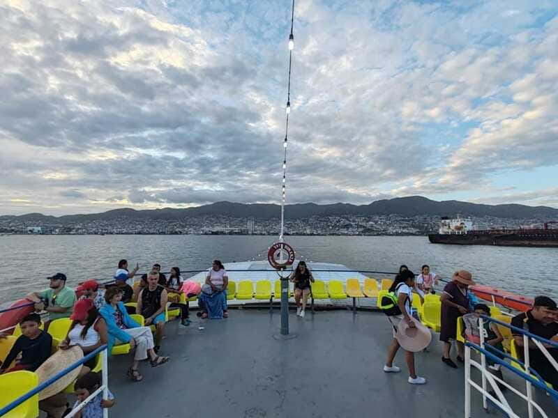 Acapulco: Sunset on Yacht Bonanza Tour - Entertainment on the water: contests, live music, and a surprise show