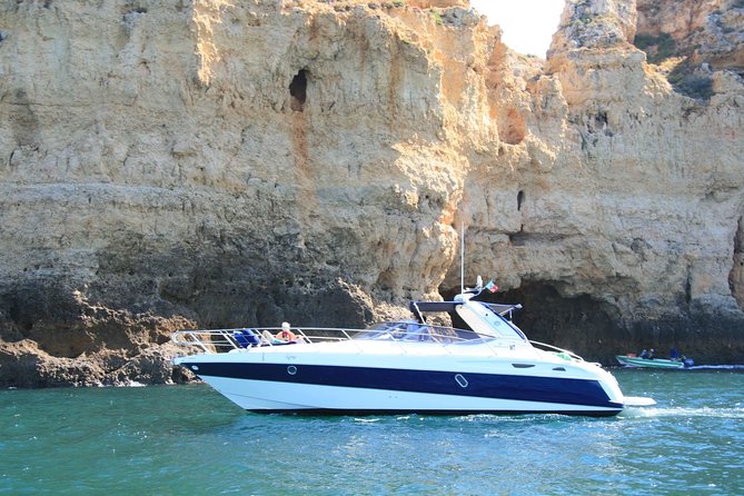 Afternoon yacht charter in lagos with drinks, tapas, paddle boards and kayak - SUPs and an inflatable kayak: how the water play works in real life