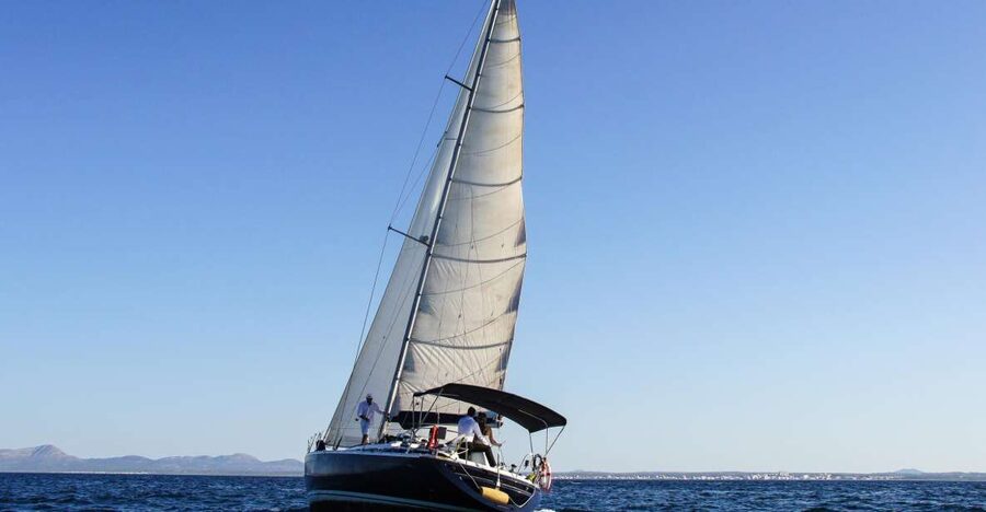 Alcudia: Sailing Yacht Excursion with Wine & Tapas - Taking the wheel: the fun part for non-sailors