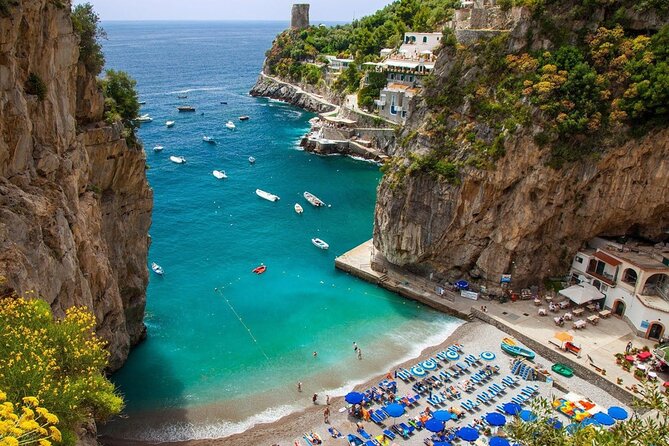 Amalfi Coast Private Boat Tour from Sorrento, Positano & Capri - Pupetto Beach Club: a short famous beach moment