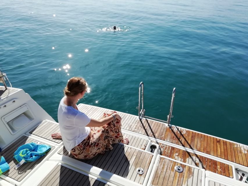Barcelona: Luxury Private Yacht Daytime Cruise - Entering Port Olimpic: Where Amaris Is Waiting