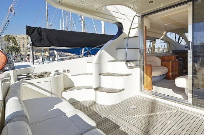 Barcelona Private Luxury Yacht Tour - Swim time that’s actually set up for you: snorkeling gear, towels, and paddle surf board