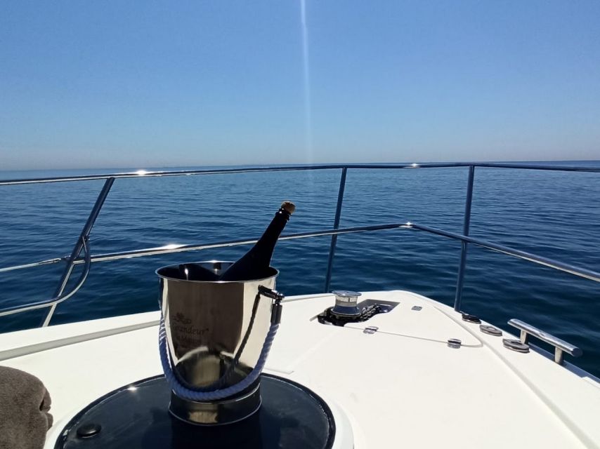 Barcelona: Private Motor Yacht Charter with Drinks and Food - Secret Stop: Swimming, Snorkeling-Style Water Time, and SUP