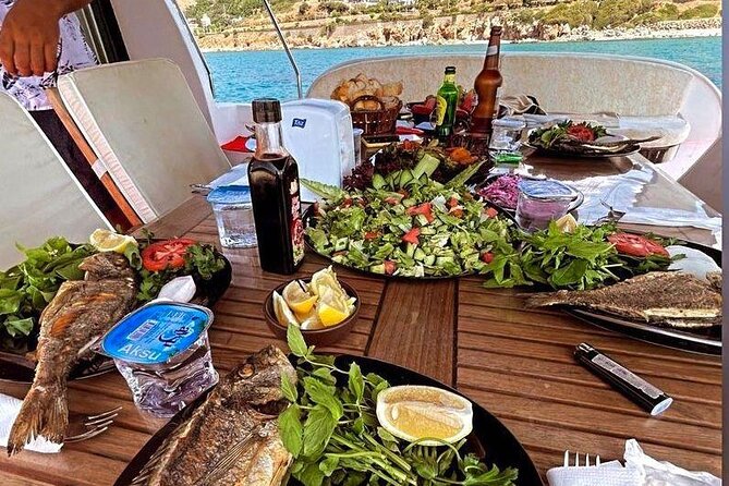 Bodrum Private Motor-Yacht Sunset Tour With Dinner For 3 Hour - Dinner on the Water: Fish, Chicken, or Vegetarian (and Soft Drinks Included)
