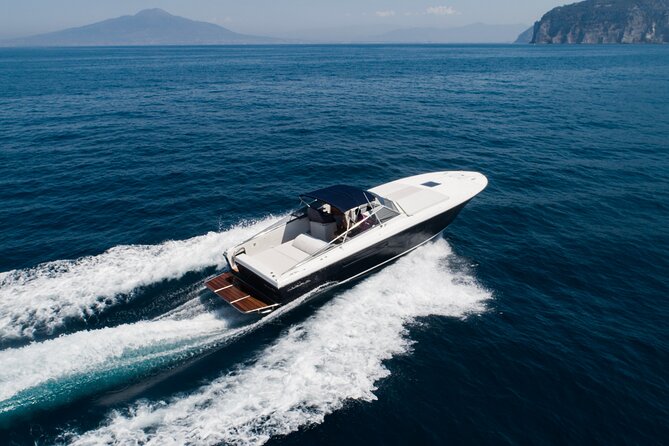 Capri Private Yacht Tour from Sorrento, Capri & Positano - Getting your first Capri views: Faraglioni, Marina Piccola, and Piazetta