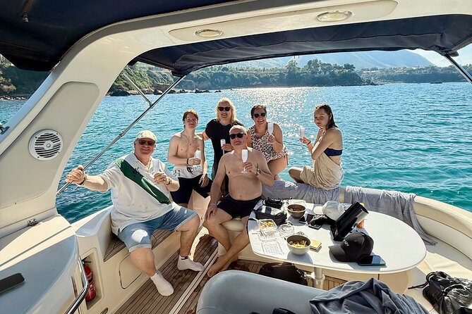 Cefalù : Mini Yacht Tour with Aperitif, Snorkeling and Caves - Spiaggia Caldura: stacks, clear water, and the best kind of “just swim”