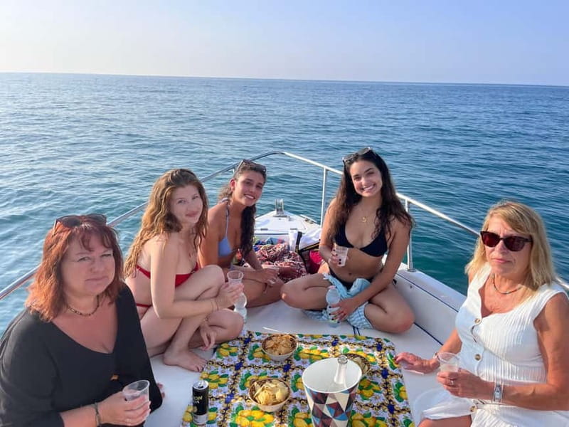 Cefalù: Mini Yacht Tour with Caves, Snorkeling, and Open Bar Aperitif - Sant’Ambrogio Bay and Santa Lucia Cave: Where the Boat Becomes the Attraction