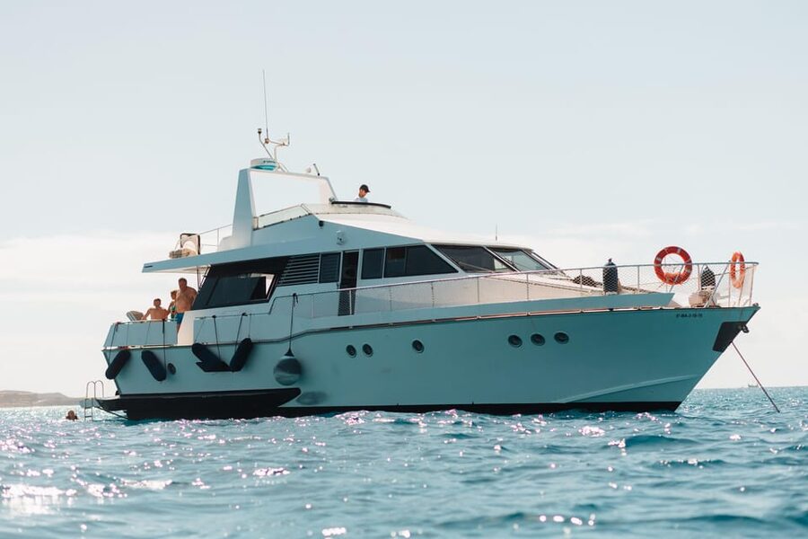 Costa Adeje: Private Yacht Trip with Watersports and Slides - Watersports that actually fit a family day: slide, snorkelling, underwater scooter, SUP, kayak, and water bike