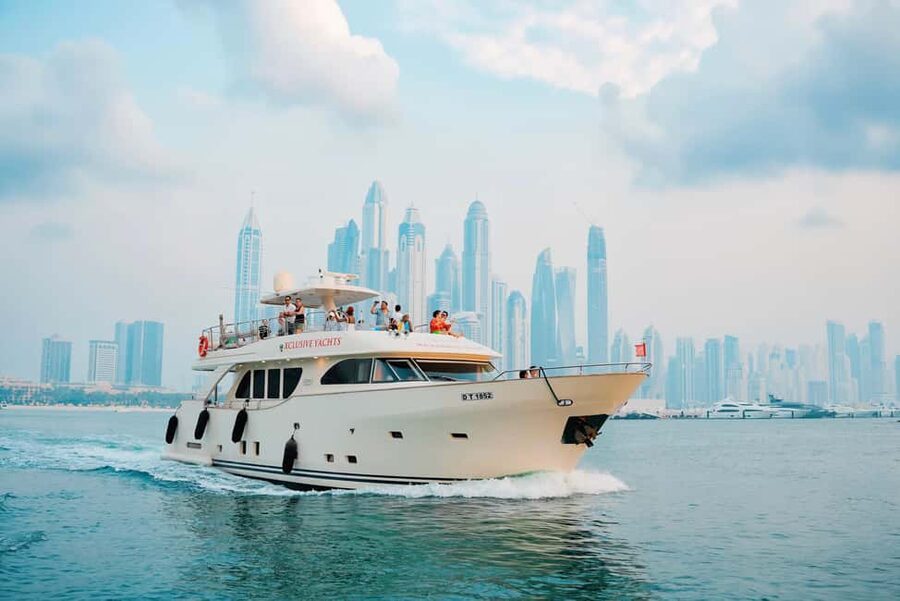 Dubai Marina Yacht Tour: Ain Wheel, JBR & Harbour in 1 Hour - Onboard comfort: open-air deck, VIP touches, and included drinks