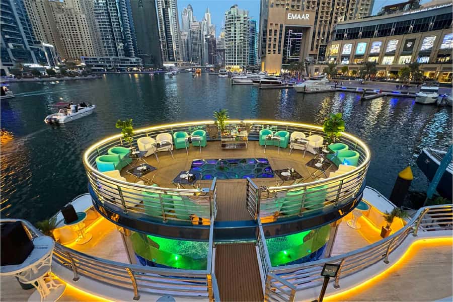 Dubai: Mega Yacht Dinner Cruise with Buffet - Live entertainment at sea: tanoura, aerial acts, and DJ music