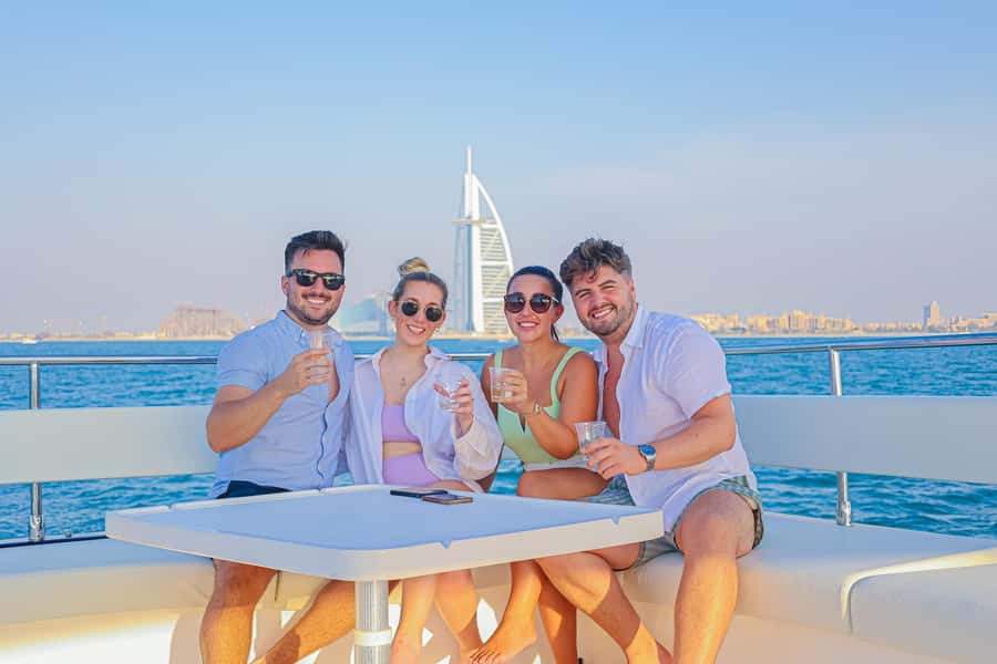 Dubai Waves & Dunes: Luxury Yacht Cruise w/ Red Dunes Safari - Getting Picked Up in Dubai, Sharjah, or Ajman