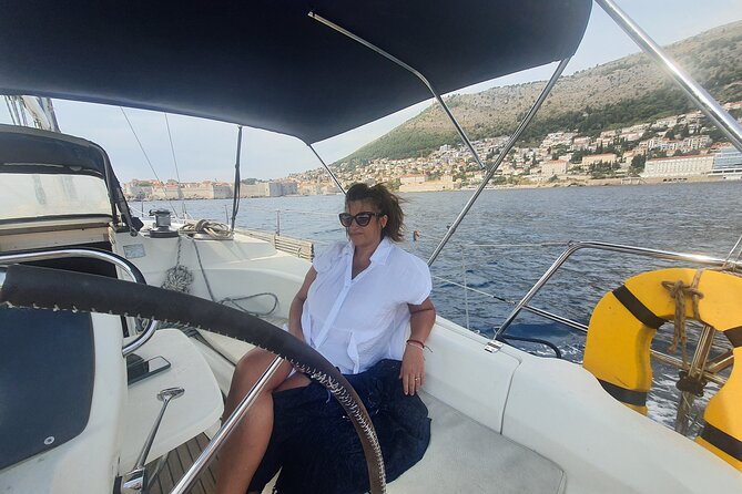 Dubrovnik : Full Day Group Sail Boat Tour to Elaphiti & Blue Cave - How the boat day feels: small group, captain-led efficiency, and steering time