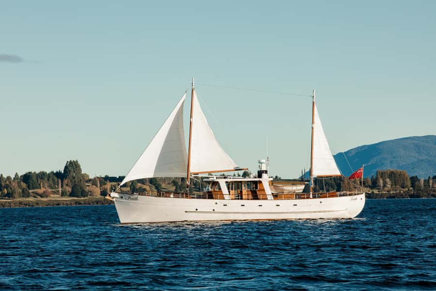 Evening Champagne Cruise on Historic 1935 Motor Yacht. - Lake Te Anau After Dark: Champagne, Canapés, and Golden Light