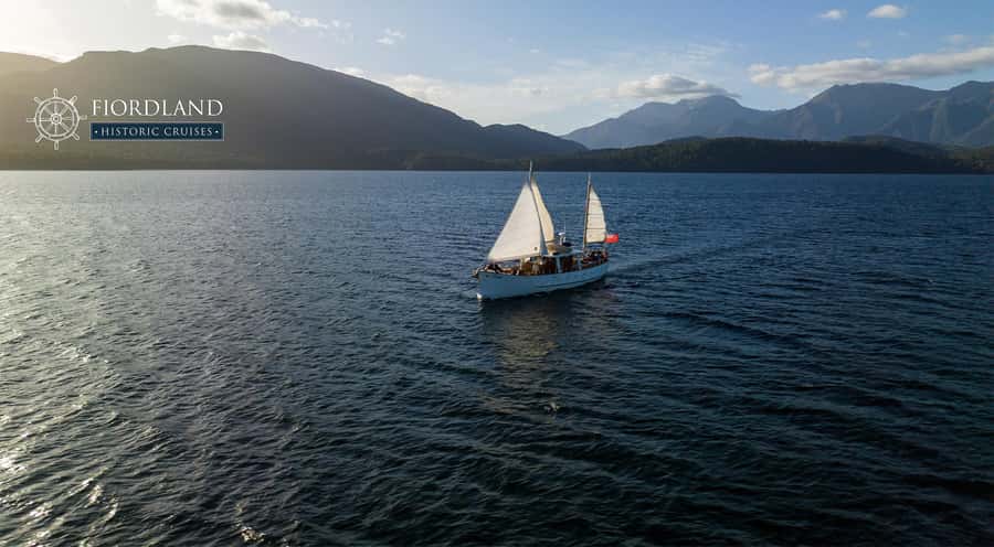 Evening Champagne Cruise on Historic 1935 Motor Yacht. - A Calm Stop in a Sheltered Cove