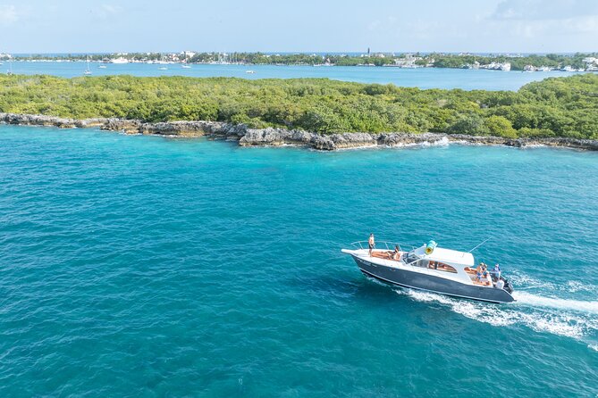 Exclusive Isla Mujeres and Cancun Private Yacht Tour - Snorkeling near the island: gear is included, and the crew helps you see