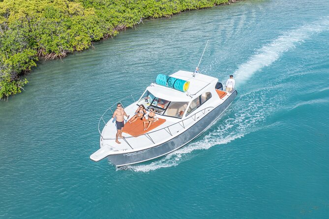 Exclusive Isla Mujeres and Cancun Private Yacht Tour - Open bar, snacks, and Bluetooth music that keeps the mood right