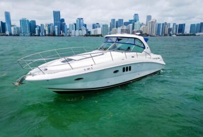 Fort Lauderdale: Private Yacht Cruise - The Sundancer 40 setup: comfort, restroom, and Bluetooth music