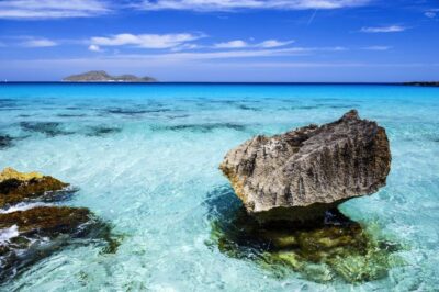 From Trapani: Favignana and Levanzo Yacht Tour with Stops - Favignana From the Water: Village Views and Coves That Take Over Your Day