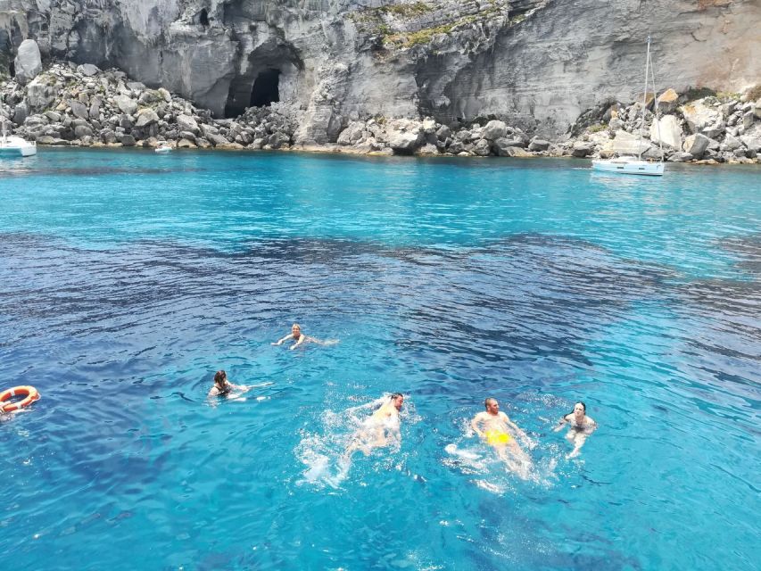 From Trapani: Favignana and Levanzo Yacht Tour with Stops - Lunch on Board: Rice Salad, Then Back to the Sea