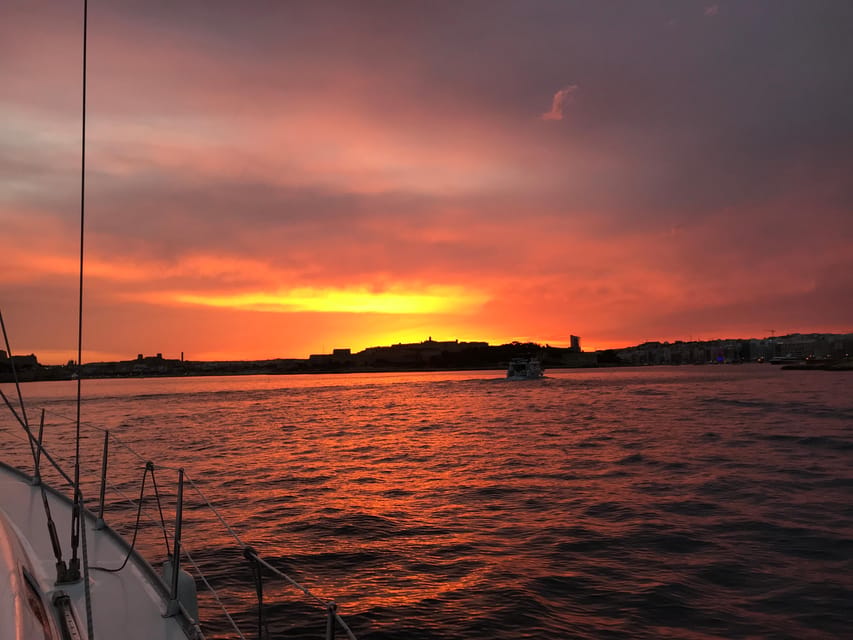 From Valletta: Romantic Sunset Cruise on a Sailing Yacht - Anchoring for dinner under the stars at Manoel Island or Rinella Bay