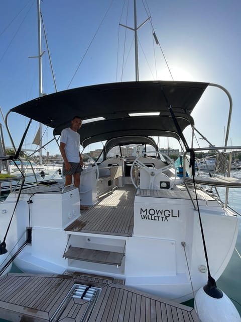 From Valletta: Romantic Sunset Cruise on a Sailing Yacht - The captain touch: music, help with romance, and a calm, guided pace