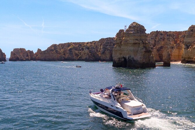 Full day private yacht from lagos with drinks, tapas, paddle boards and kayak - Marina to Cliffs and Coves: Ponta da Piedade in Real Scale