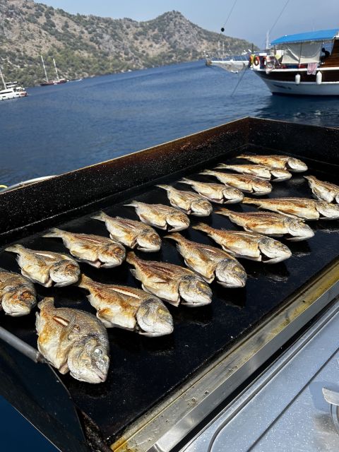 Gocek: Yacht Trip and 12 Island Full-Day Tour with Lunch - Hamam Koyu lunch stop: fish or chicken, plus tea timing