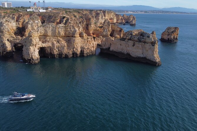 Half Day Private Charter morning /afternoon Yacht in Lagos - Dona Ana Beach: Limestone Cliffs and Calm-Tinted Water