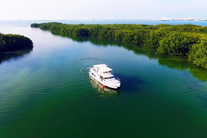 Isla Mujeres Full Day Tour on Yacht with Snorkel and Buffet - Back on Board: Music, Crew Games, and the Sunset Return