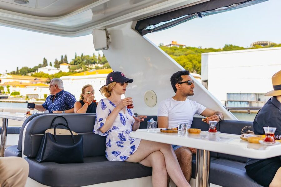 Istanbul: Bosphorus Yacht Cruise with Stopover on Asian Side - Under the bridges and past fortresses: the Istanbul engineering tour
