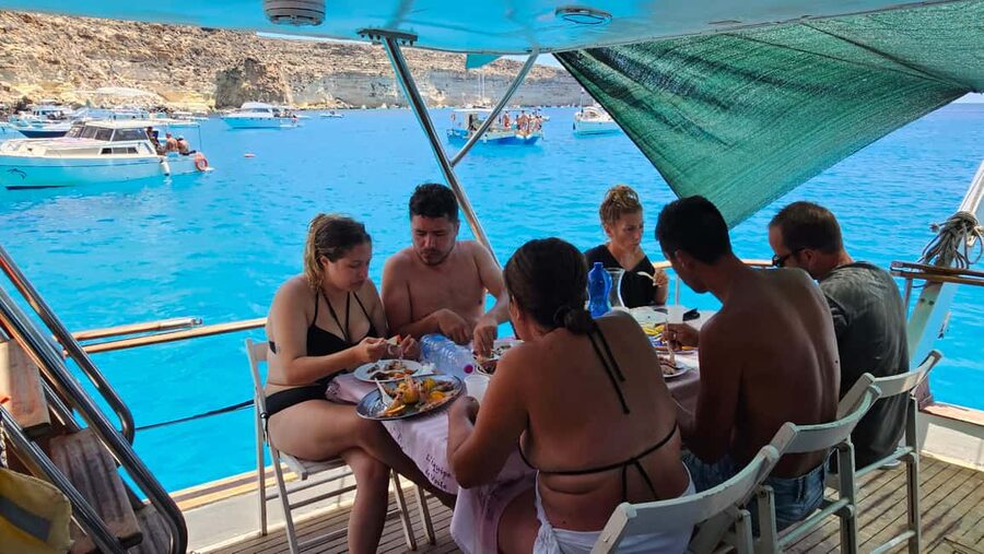 Lampedusa: Yacht excursion, swimming stops and typical lunch - Meeting point and timing: what a 9:15 departure really means