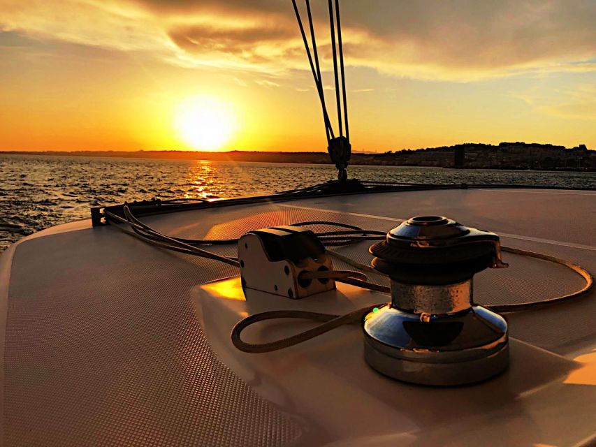 Lisbon: Sunset Cruise With Drinks on Spacious Yacht - The 25 de Abril Bridge and the ride back: clean, satisfying finale