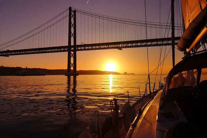 Lisbon Sunset Sailing Tour on Luxury Sailing Yacht with 2 Drinks - Weather reality check: cold wind doesn’t automatically ruin the sunset