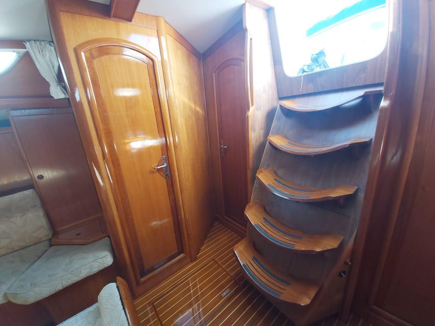 Lisbon: Yacht Sailing Tour With Portuguese Wine and History - Wine, blankets, and crew energy: Why the mood matters