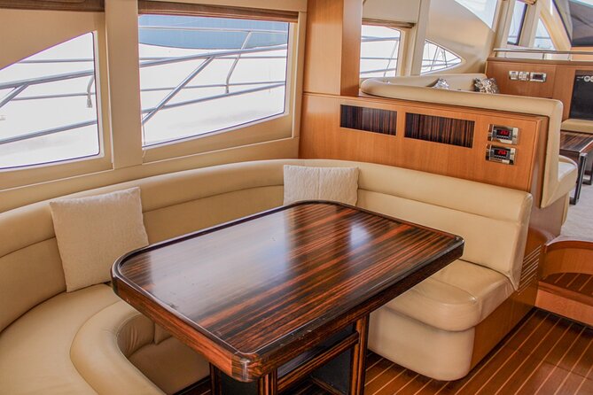 Luxury Yacht Dubai - Book 56 ft Yacht Cruise up to 24 people - Bluewaters and Ain Dubai: a big Dubai Eye-style shot from the water
