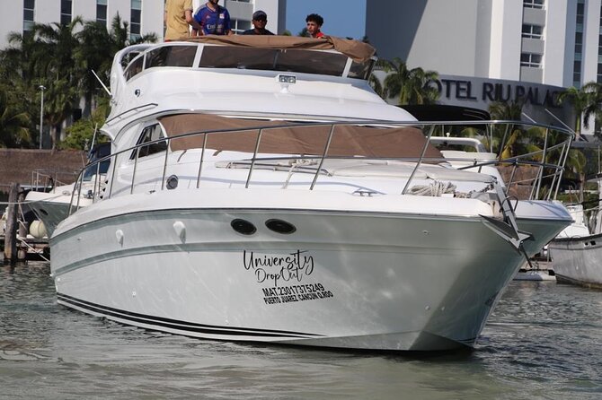Luxury Yacht in Paradise and snorkel by Isla Mujeres - The Crew and Photo Help That Turns It Into a Memory