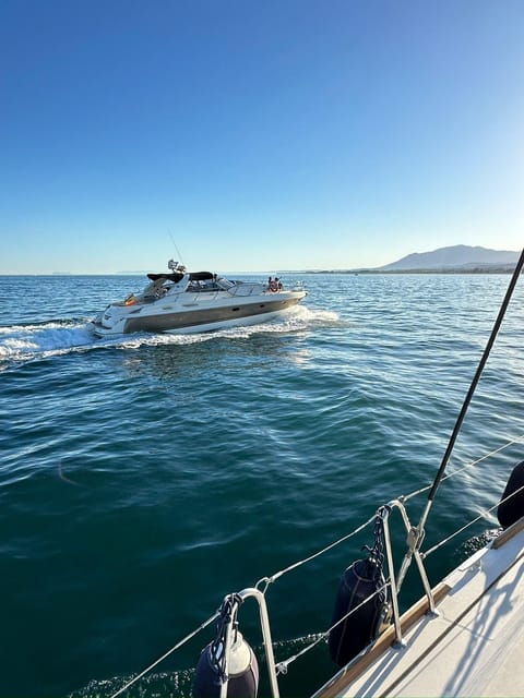 Marbella: Private Cruise in Luxury Yacht - Water Sports Time: Paddle Surf, Snorkel, and Fishing Gear