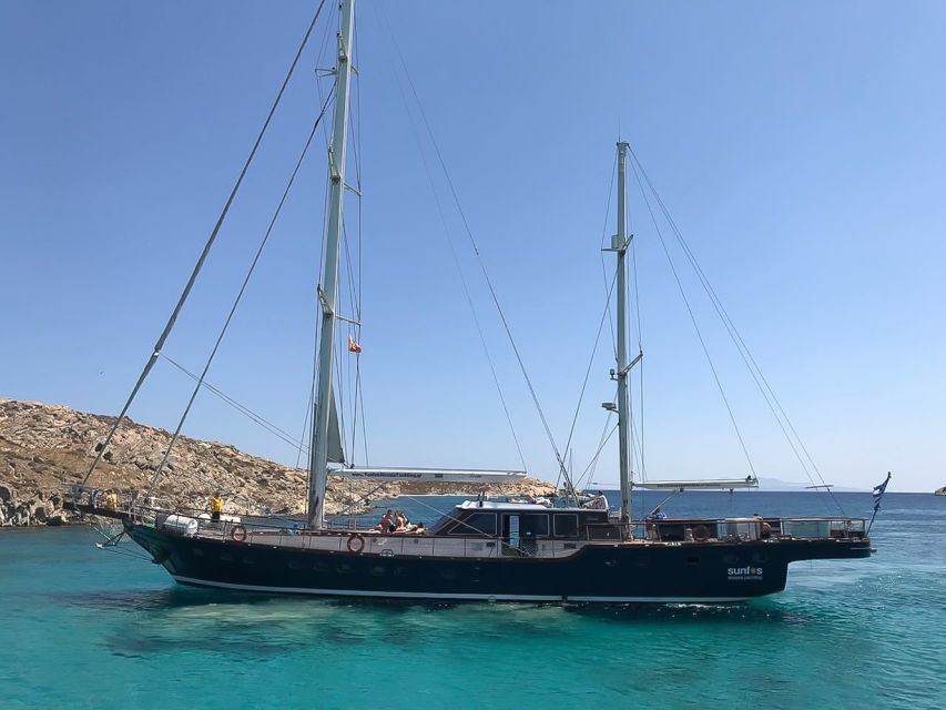 Mykonos: Yacht Cruise to Rhenia and Guided Tour of Delos - Lunch Onboard: Greek Pasta, Greek Salad, Fruit, and House Wine