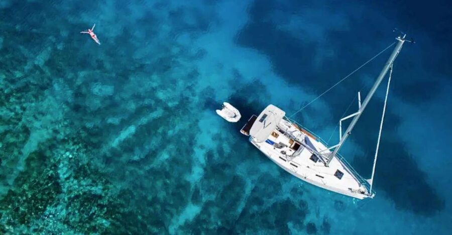 Palawan: Private Sailing Yacht Cruise in El Nido - Malpacao Island: snorkeling, a deserted-beach pause, and lunch onboard