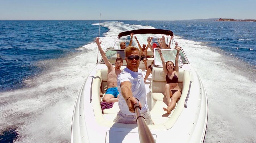 Palma de Mallorca: Private Yacht Trip with Drinks - Relaxing on sun loungers with drinks that keep the vibe comfortable