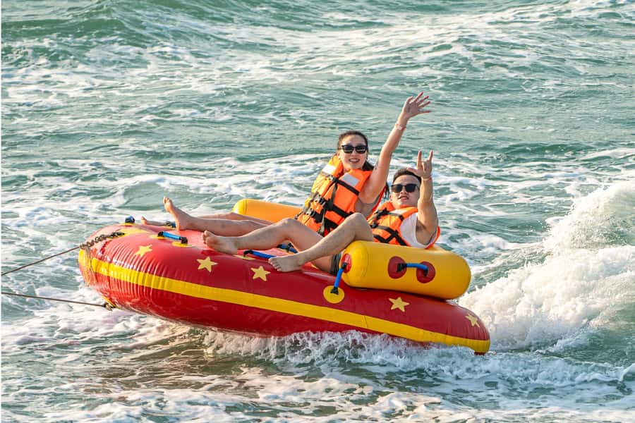 Pattaya: 3-Island Hopping Sunset Yacht & Buffet with Live DJ - Koh Rin: water sports again, with a second snorkeling window