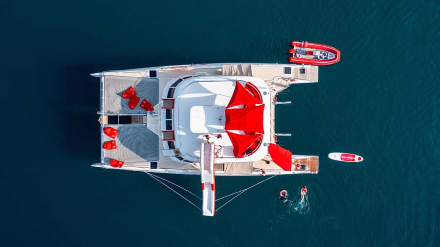 Pattaya: Full-Day 2 Islands Yacht Trip with Lunch and Sunset - Koh Phai (Mu Ko Phai Marine Park): snorkeling, swimming, floating pool, and the slide