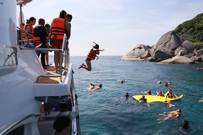 Phi Phi Island & Maiton Island Full Day Tour with Luxury Yacht - The Ocean King lunch, drinks, and the onboard photo service