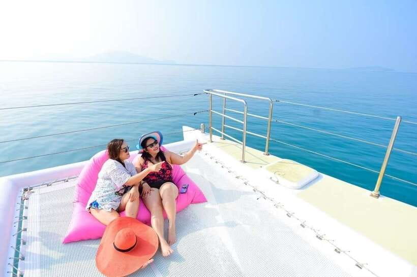 Phuket: Coral Yacht Boat Tour to Coral Island with Sunset - Raya Island Snorkel Stop: Another Chance to See Coral and Fish