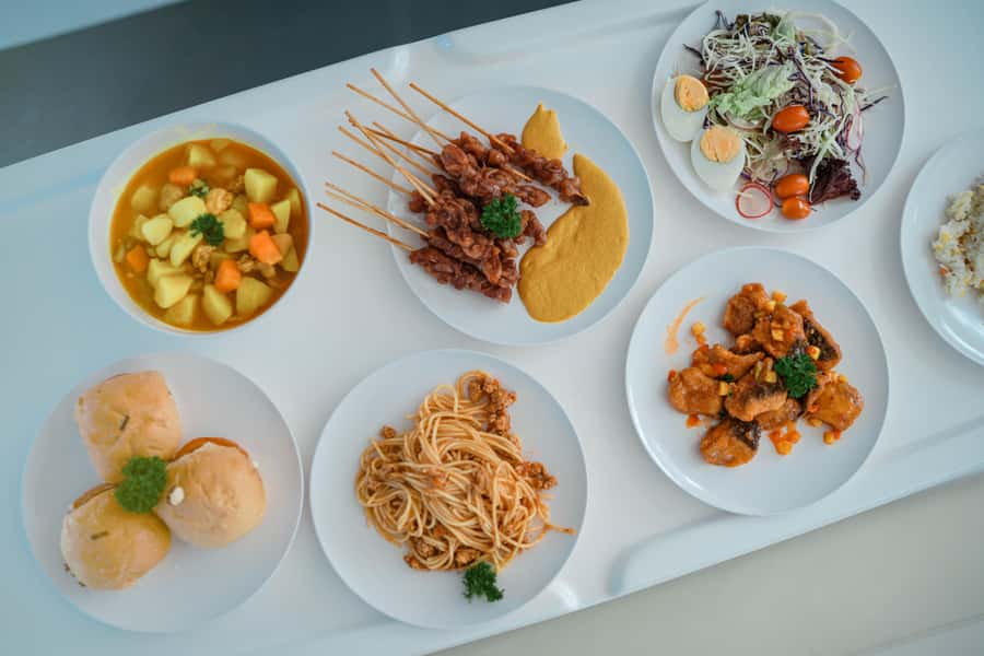 Phuket: James Bond & Phang Nga Bay by Luxury Sunset Yacht - Naka Island Beach Time: Slides, Clear Kayaks, and Marine Views