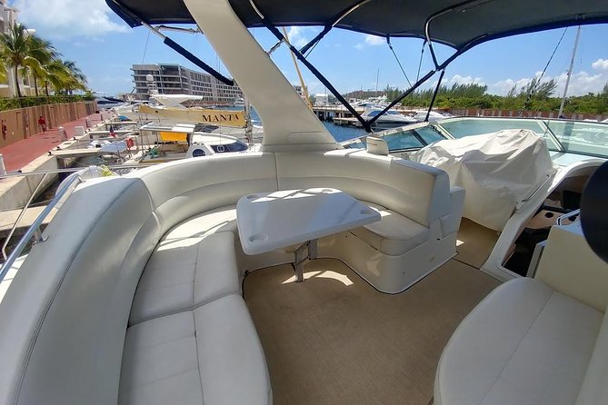 Playa Mujeres rent a Yacht 4hrs with Food and drinks aboard CA55 - Stop 1: leaving Cancun and cruising along the coast