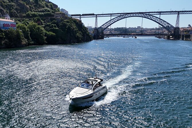 Porto: Private Yacht Experience with Local Wines & Snacks - Dom Luís and Ribeira do Porto: skyline views with a photo window